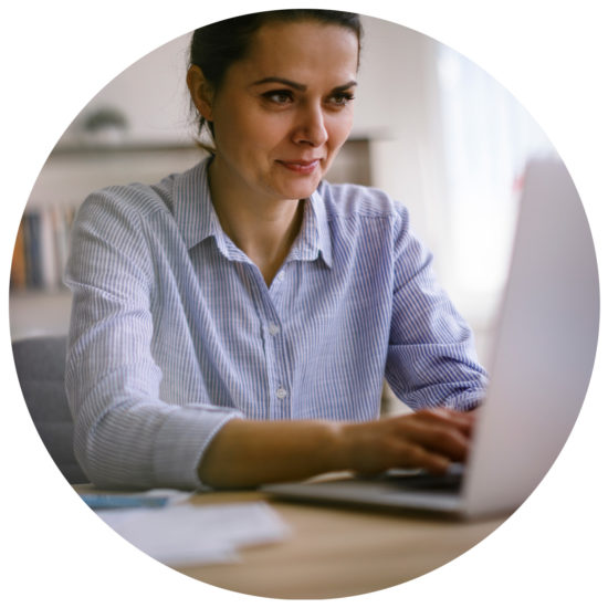 Image of woman watching QIP Certifications' complimentary webinar Woman watching a webinar